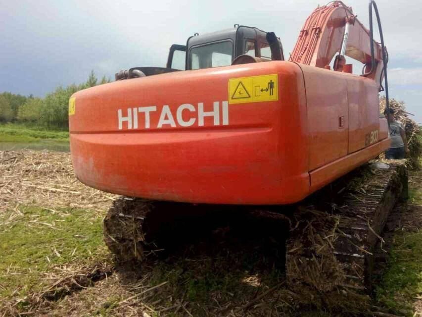 日立 ZAXIS120 油圧ショベルがゆっくり歩いていることを診断するにはどうすればよいですか?